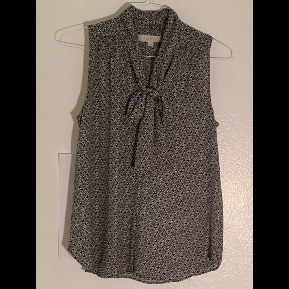 Black and white floral blouse with bow